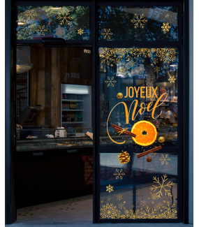 photo-vitrine-stickers-noel-texte-joyeux-noel-cannelle-orange-chocolats-frises-cristaux-dores-or-gold-vitrophanie-electrostatique-repositionnable-reutilisable-sans-colle-DECO-VITRES